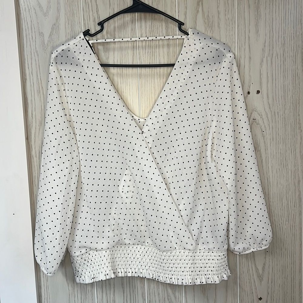 A. Byer White with black polka dots blouse. V-neck with 1/2 sleeves.